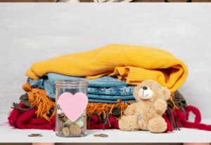 donation-based crwodfunding items including clothing, blankets, a teddy bear, and money